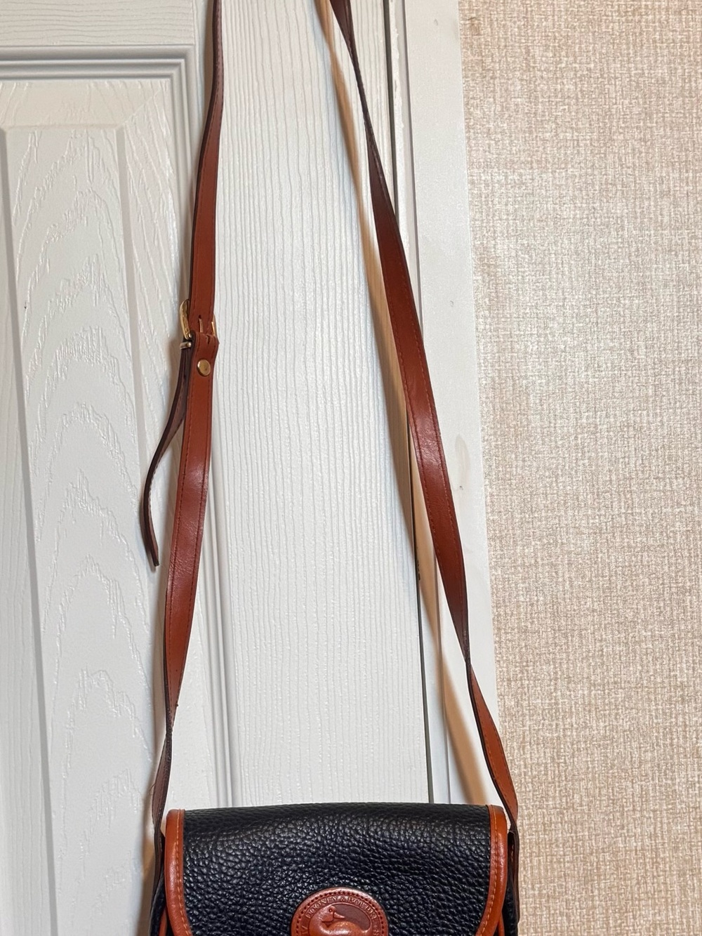 Dooney & Bourke Navy Pebbled Leather Crossbody with Brown Trim